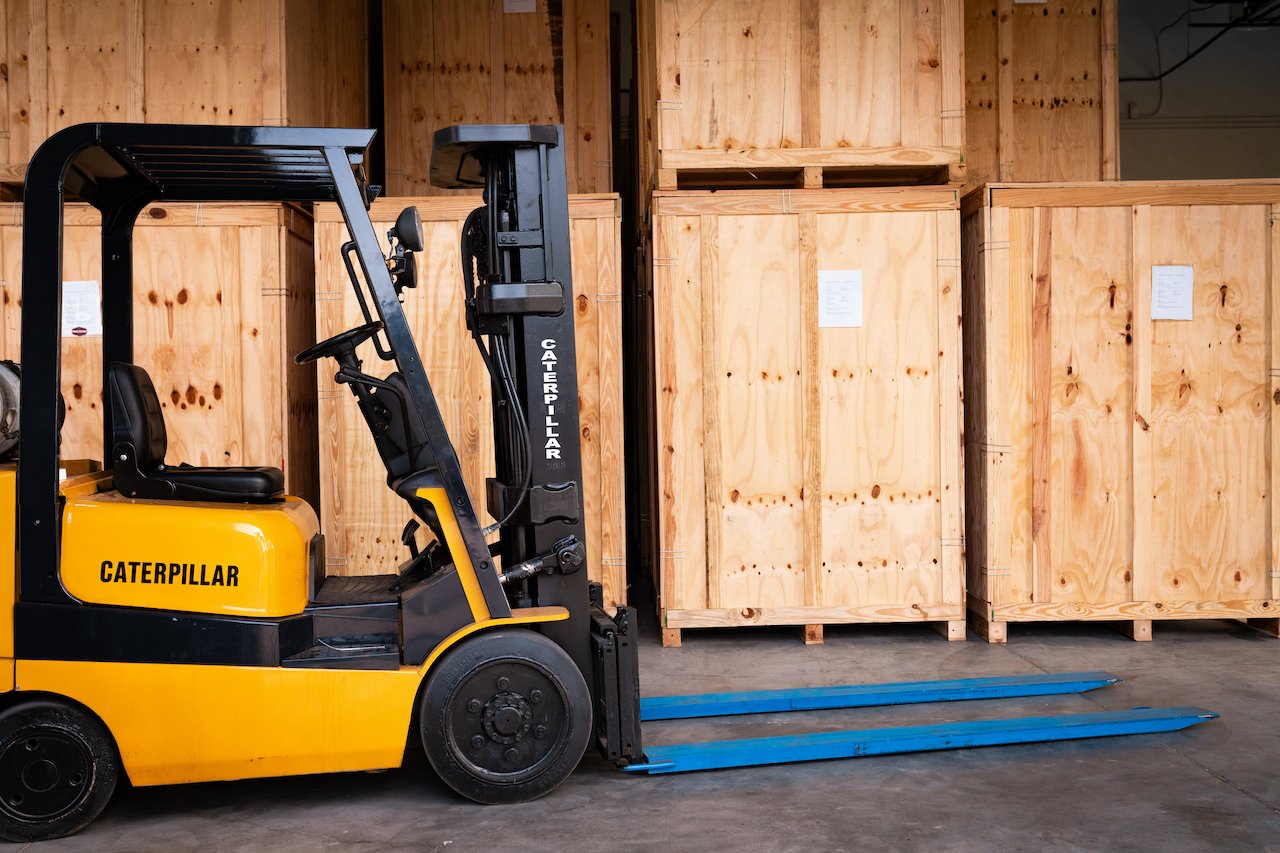 Caterpillar forklift parked at warehouse